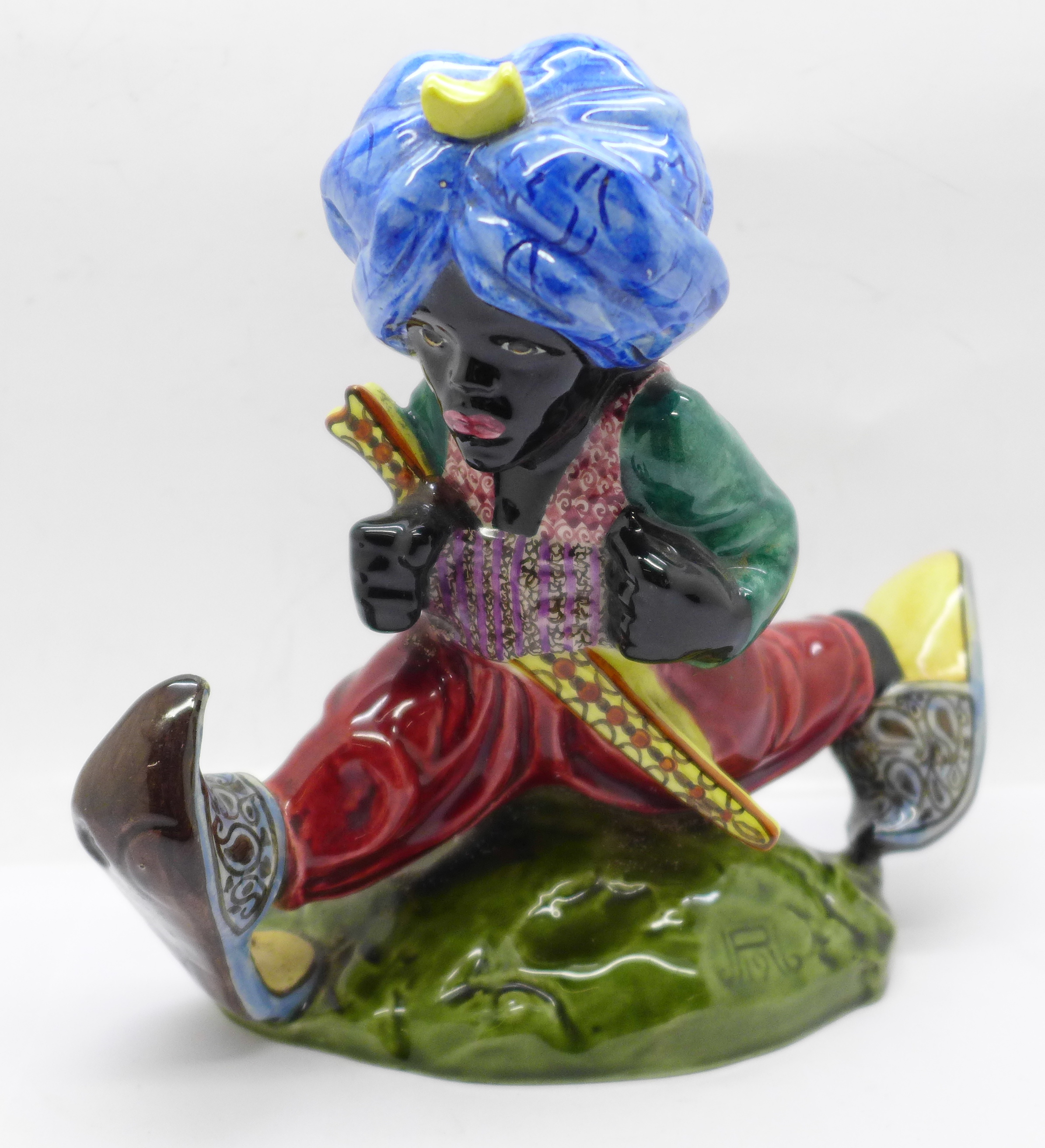 A Weiner Werkstatte Blackamoor figure, circa 1910, 16cm, a/f (chip to base)