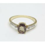 A 9ct gold colour change garnet ring with diamond shoulders, with certificate, 2.4g, N