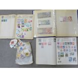 An album of thirty world bank notes and an album of stamps and loose stamps