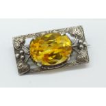 An Arts and Crafts citrine set silver brooch, 15mm x 28mm