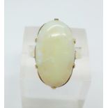 A 9ct gold and opal ring, 6.2g, R, stone 15mm x 25mm