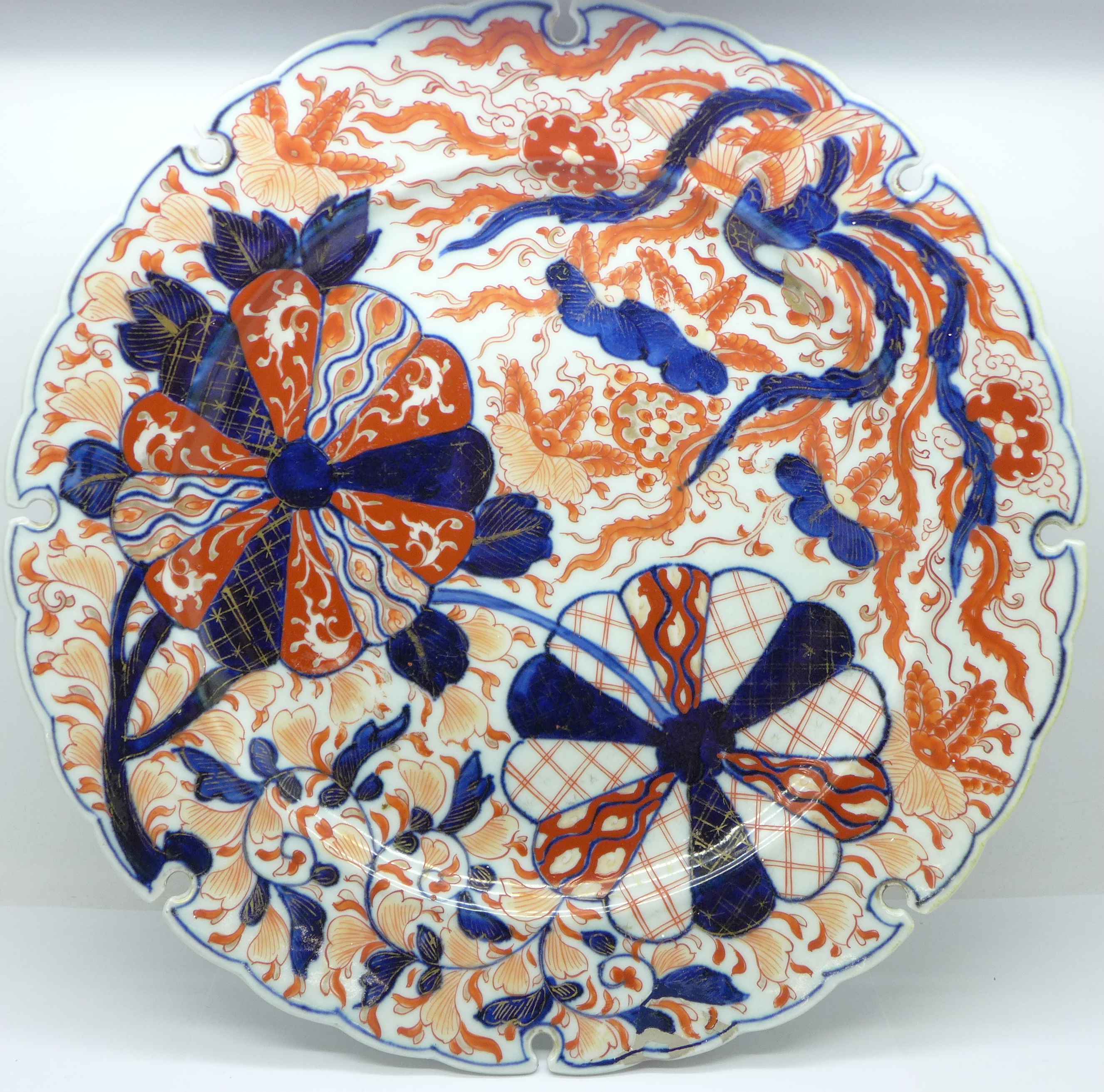 A large Imari dish, rim restored, 31cm