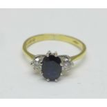 An 18ct gold, sapphire and diamond three stone ring, 2.3g, L