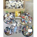Five tins of vintage buttons, buckles and a box of cream buttons