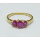 A 9ct gold, diamond and ruby ring, 1.9g, N
