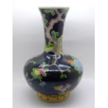 A Chinese famille noir vase, 25cm