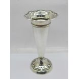 A silver specimen vase, weighted, 13.5cm, (a/f, small dents and split on the rim)