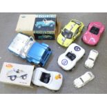 Die-cast model vehicles including three VW Beetle cars, four Tonka including a mini Tonka with