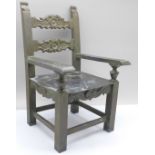 A small metal dolls chair, height 23.5cm