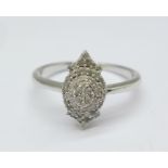 A silver and diamond ring, U