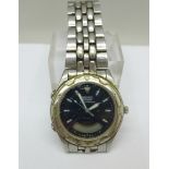A Seiko quartz alarm chronograph wristwatch, bezel scratched