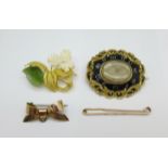 Four brooches; a 9ct gold bar brooch, 1.8g, a Victorian 'In Memory Of' mourning brooch, a spray