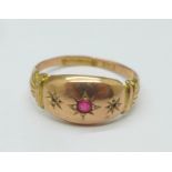 A 9ct gold and red stone ring, Birmingham 1918, 2g, O