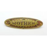 A Victorian gold front 'Mother' brooch, marked A.J.C.