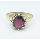 A 9ct gold and garnet ring, 2.8g, X