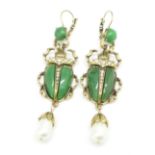 A pair of scarab beetle earrings