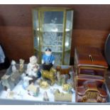 A collection of figures including Wade Whimsies and other Wade including a money box and display