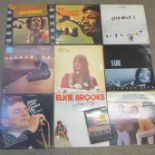 A collection of eleven LP's including Jimi Hendrix, Stoneground, etc., and a Level 42 DVD