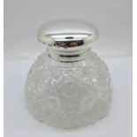 A large hallmarked silver and cut glass ink well, diameter of base 11cm