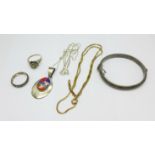 A silver bangle, a silver Ella Peter Navajo pendant, a silver rose ring, N, a 9ct and silver ring,