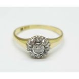 An 18ct gold and diamond cluster ring, 3.4g, V