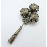 A sterling silver baby's rattle/whistle