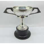 An Art Nouveau silver trophy, hallmarked Chester 1914, with inscription dated 1955, 168g, height