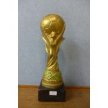 A reproduction World Cup trophy