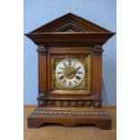 A 19th Century German Junghans oak architectural cased oak mantel clock