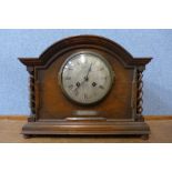 A Mappin & Webb oak barleytwist mantel clock