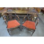 A pair of Hepplewhite Revival mahogany elbow chairs