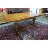 A 17th Century style carved oak refectory table