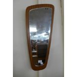 A teak framed mirror