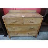 An Art Deco light oak chest of drawers