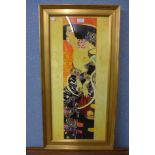 A Gustav Klimt print, framed