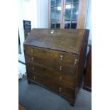 A George III oak bureau