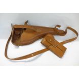 A leather gun holster and a case, case strap a/f
