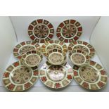 Eight Royal Crown Derby 1128 pattern side plates and three pin dishes, all seconds