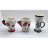 Lorna Bailey, two mugs in the Charles Rennie Mackintosh pattern, 10cm, and a limited edition mug,