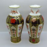 A pair of Royal Crown Derby 1128 Old Imari vases, seconds, 18cm