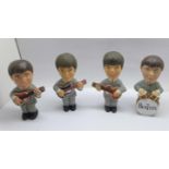 The Beatles, four model figures, 12cm