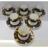 A set of six Royal Crown Derby Vine Cobalt coffee cans and saucers