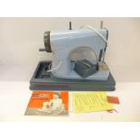 A Jones Meccano toy sewing machine, boxed