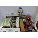 A collection of toys including Britains animals, die-cast, tin-plate and plastic vehicles,