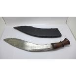 A kukri with wooden handle and scabbard