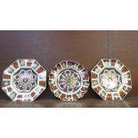 A pair of Royal Crown Derby Old Imari 1128 octagonal plates and a wavy edged plate, all seconds