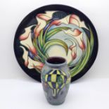 A Moorcroft plate, Sian Leeper, 2004, 78/400, 22cm, and a Moorcroft Millennial balloon vase, Kerry