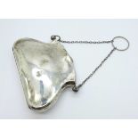 A lady's silver purse, dented, 83g