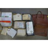 A box of cigarette cards, stamp first day covers, a 'Pyjamas' case, leather document case, etc.