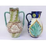 A c1900 Della Robbia two handled vase, lacking base, and a jug, both a/f, jug 22.5cm